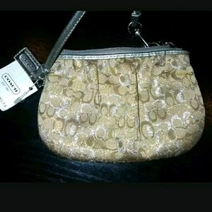 Coach Wristlet/coin.mettalic gold and silver